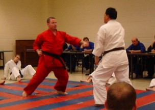 Ray (in red) at a karate meet