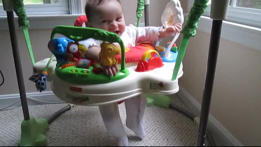 Finally getting airborne in her bouncer